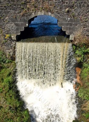 Waterfall flow from the castle wall