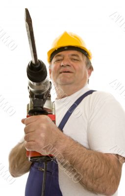 Worker with drilling machine and safety helmet