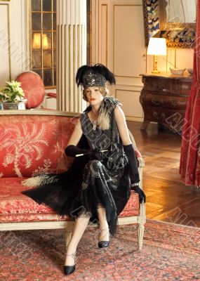 Aristocratic woman sitting in castle hall