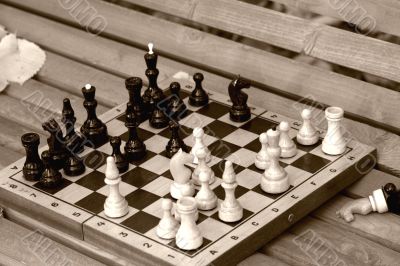 Chess board on the bench Chess board on the bench