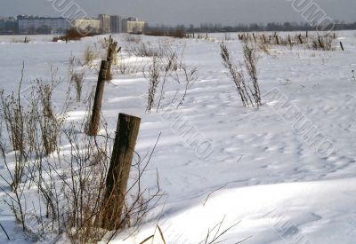 Snow field outside town