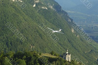 A glider flying over St Michel Church
