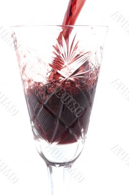 wineglass with wine on white