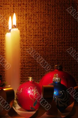 candles, balls and gold ribbons it are Christmas