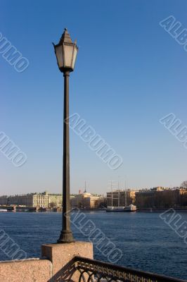 The lantern over embankment of the rive Neva