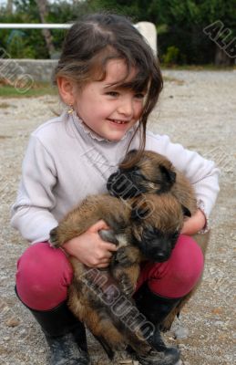 smiling girl and puppies