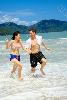 running on a paradise beach