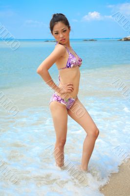 beautiful asian woman on a beach