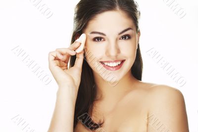 young woman with cosmetic petal