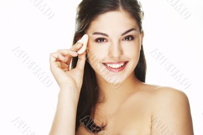 young woman with cosmetic petal young woman with cosmetic petal