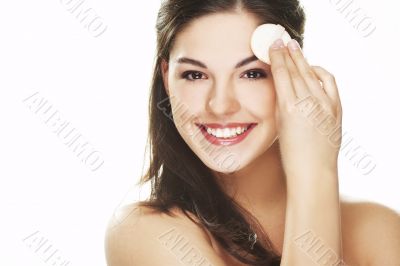 young woman with cosmetic petal young woman with cosmetic petal