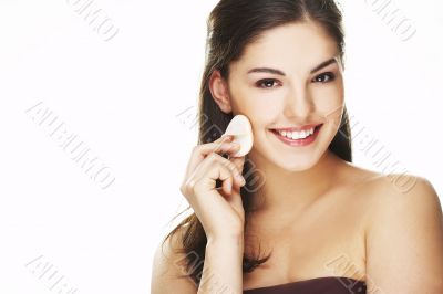 young woman with cosmetic petal