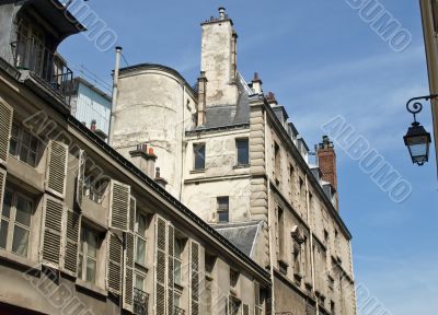 Street with old constructions in the center of Paris