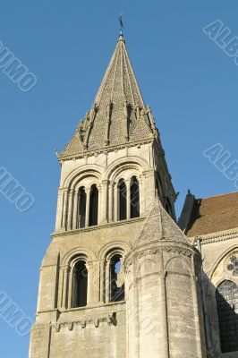 Majestic belltower on the blue sky background Majestic belltower on the blue sky background