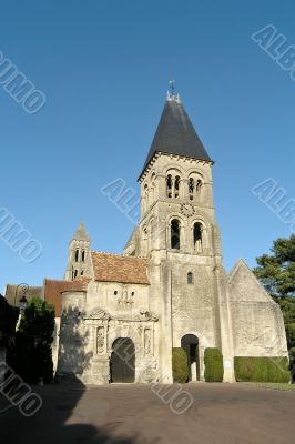 Medieval church in french province on shiny day