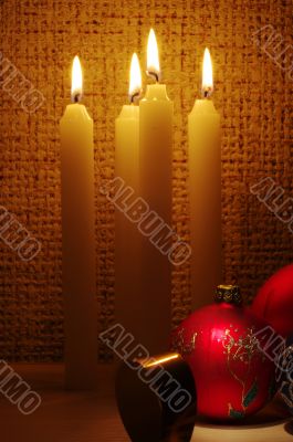candles, balls and gold ribbons it are Christmas