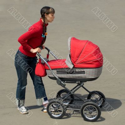 Woman with baby carriage