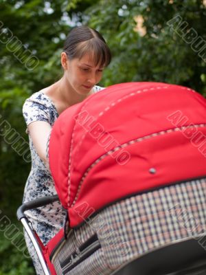 Woman with baby carriage