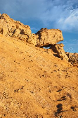 African landscape rock formations in a sand desert