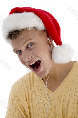 cool man with christmas hat and canal phone