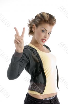 young woman showing winning gesture