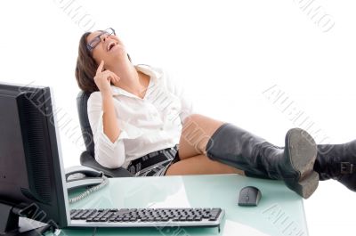 pleased woman sitting in office