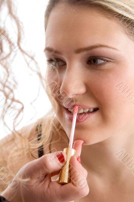 pretty model getting lip makeup pretty model getting lip makeup