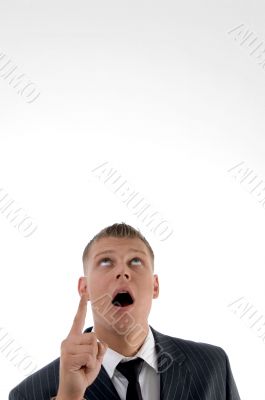 shocked businessman pointing upward