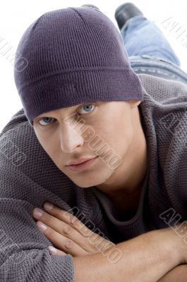 close up of handsome guy with winter cap