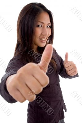 pleased female with thumbs up