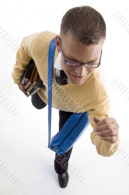 male teenaged student with study material