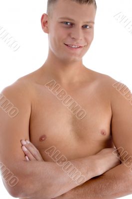 smiling muscular man with crossed arms