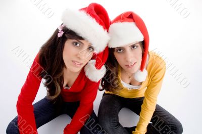 sitting females with christmas hat