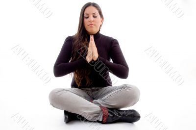 sitting praying young female
