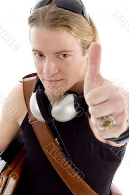 american student showing thumbs up hand gesture