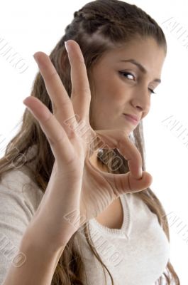 portrait of young female showing okay hand gesture