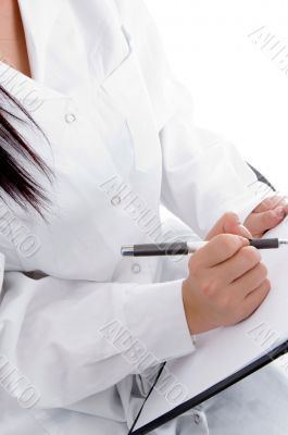 medical professional writing prescription