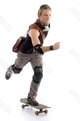young man riding a skateboard young man riding a skateboard