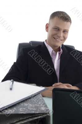 smiling businessman looking at you