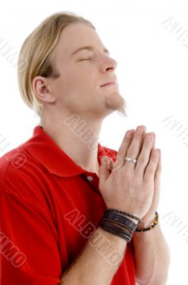 smart young male praying to god