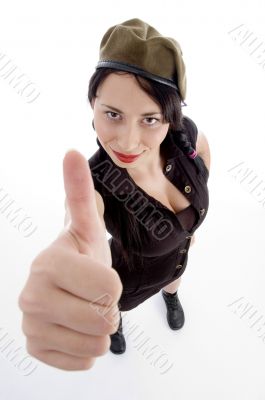 young fashionable female posing with thumbs up