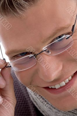 portrait of smiling young male wearing eyewear