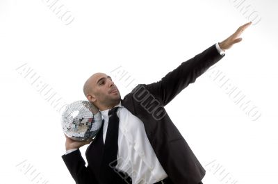 young corporate man about to throw the disco ball