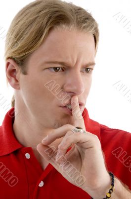 male showing keep shushing sign male showing keep shushing sign