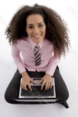 beautiful young businesswoman working on laptop
