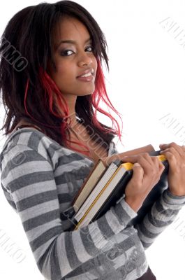 teenager student holding her study books