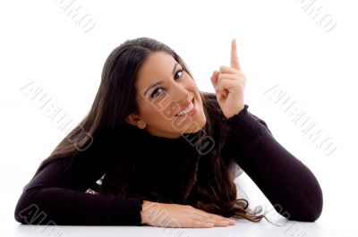 pointing female looking at camera pointing female looking at camera