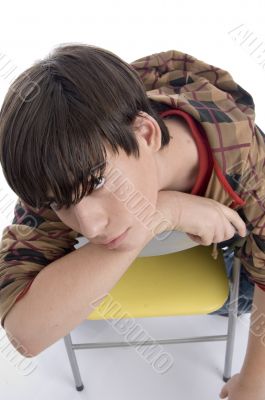 boy sitting on the chair