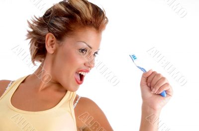 dentist posing with tooth brush