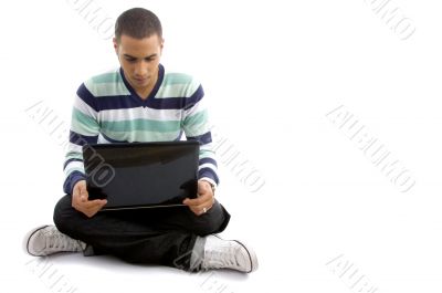 casual boy sitting with notebook